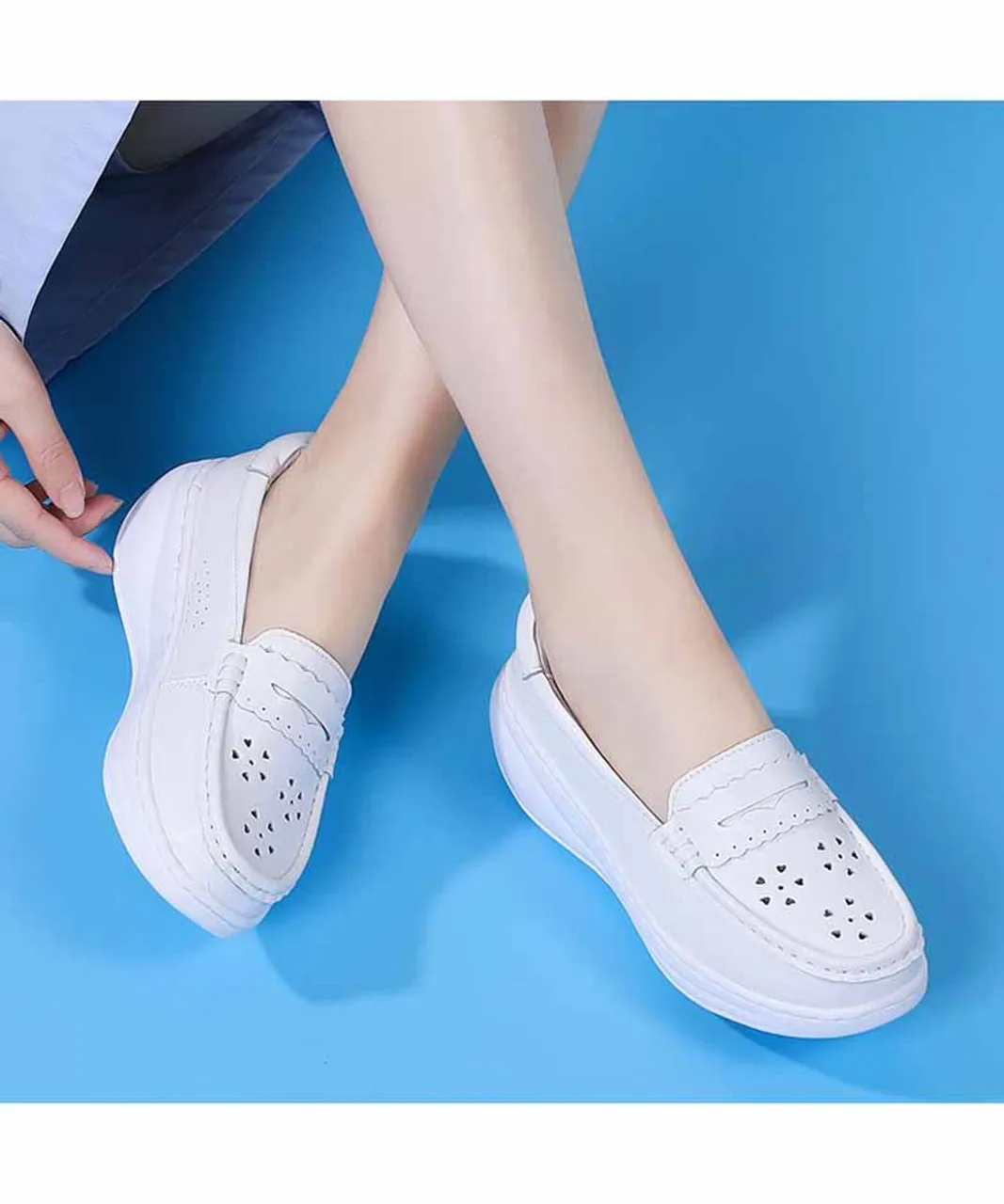 White penny hollow slip on rocker bottom sneaker