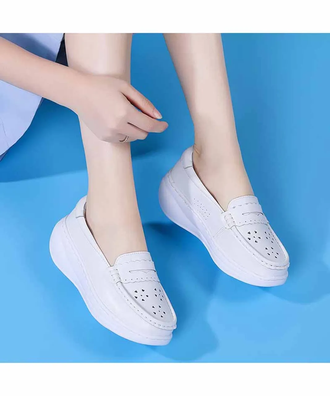 White penny hollow slip on rocker bottom sneaker