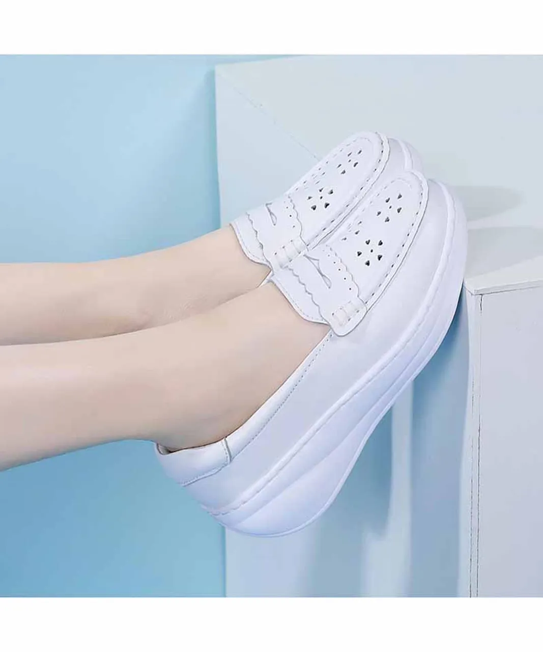 White penny hollow slip on rocker bottom sneaker