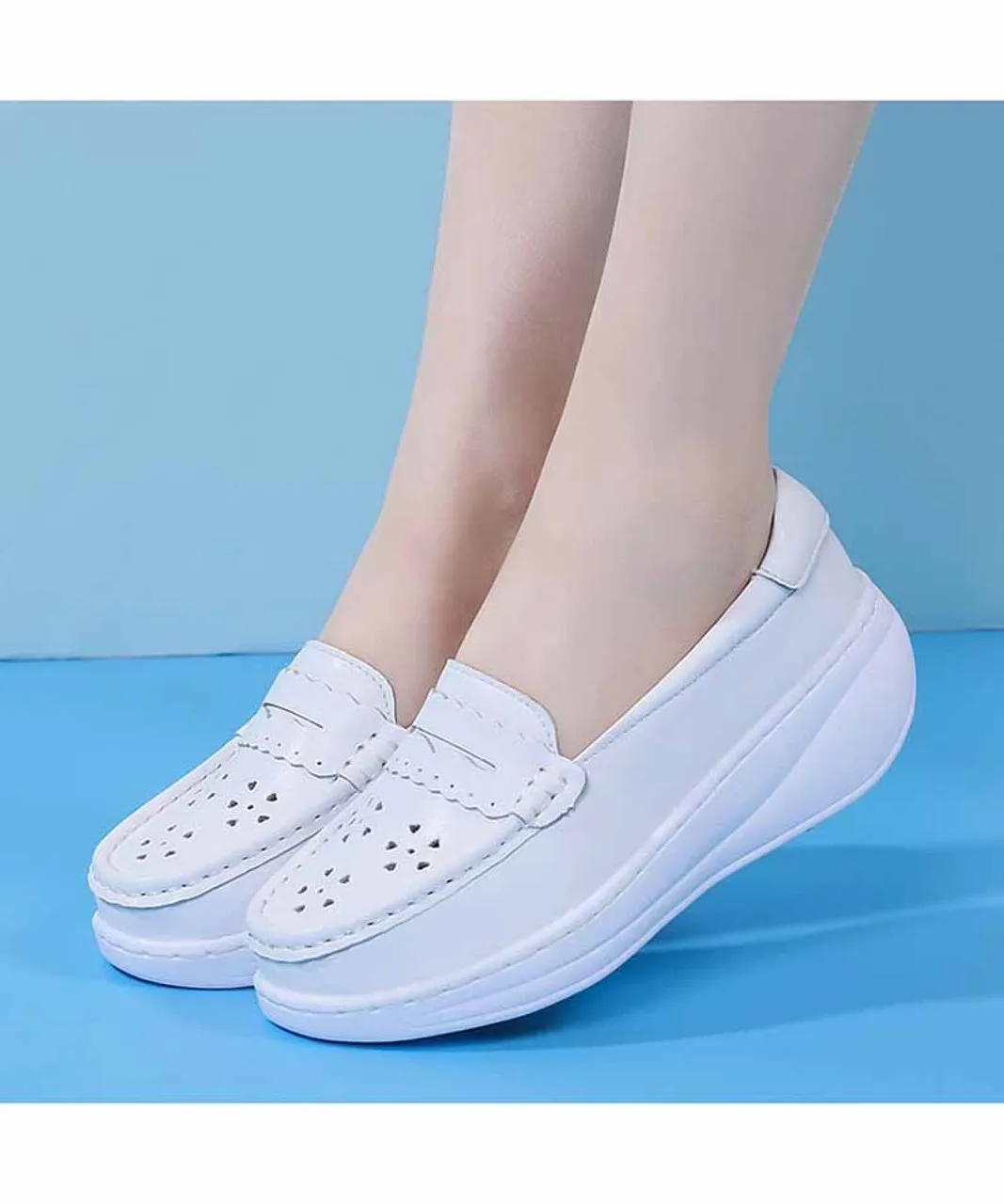 White penny hollow slip on rocker bottom sneaker